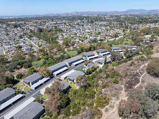 A large industrial complex sits in the middle of a residential area.
