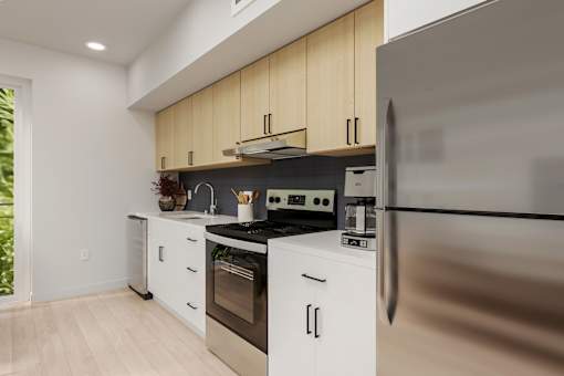 A modern kitchen with stainless steel appliances and wooden cabinets.
