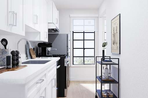 Spacious kitchen with modern appliances and abundant natural light.