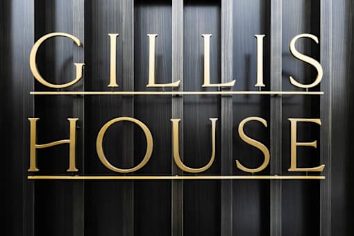 the logo or sign for the guest house