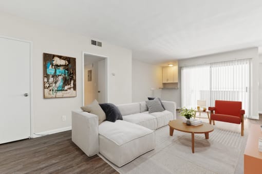 a living room with a couch and a coffee table