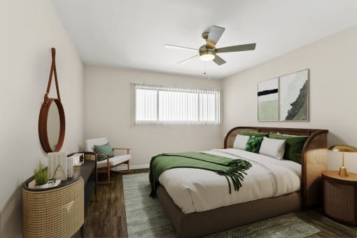 a bedroom with a bed and a ceiling fan