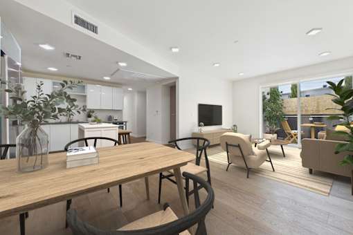 A modern dining area with a wooden table and chairs.