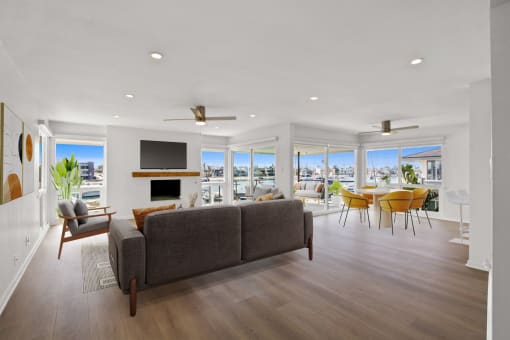 a living room with a couch and a table and a television