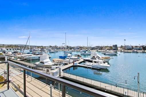 a marina with many boats docked in the water
