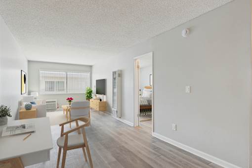 A living room with a chair and a table.
