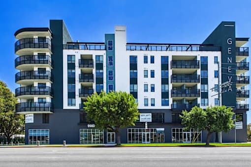 A modern multi-story building with the name "Geneva" on the top right corner.