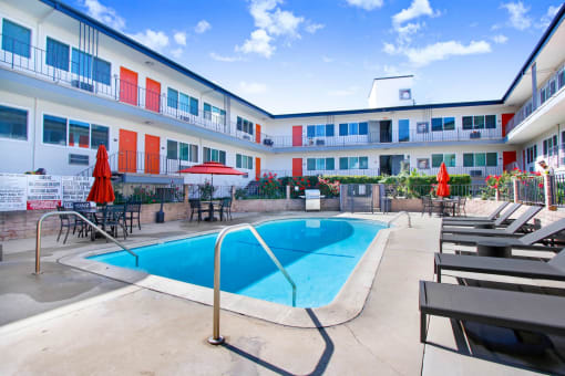 our apartments have a pool and lounge chairs in the courtyard