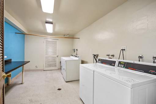 A laundry room with a washer and dryer.