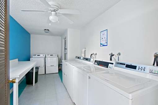A laundry room with a washer and dryer.