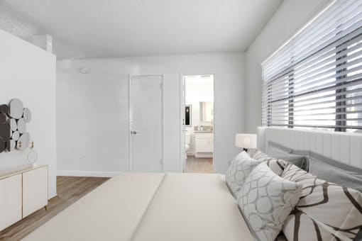 a bedroom with a bed and a closet