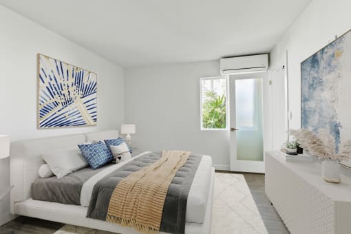 a bedroom with a bed and a door to a bathroom