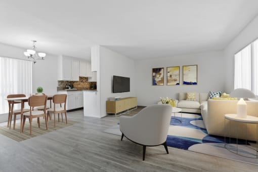 a living room and dining room with a table and chairs