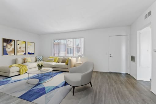 a living room with a couch and a table