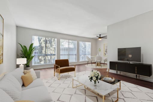 a living room with a couch and a tv