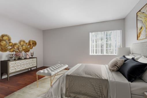 a bedroom with a bed and a dresser and a window