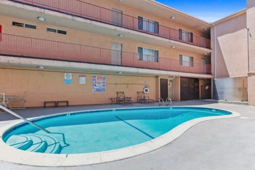 a resort style swimming pool in the middle of a building