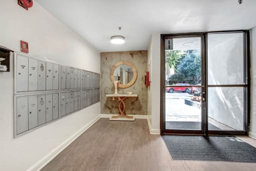 a locker room with lockers and a sink