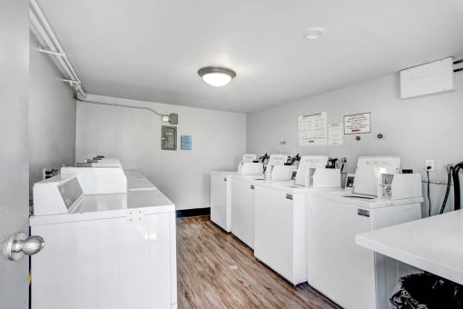 the laundry room is equipped with washes and dryers