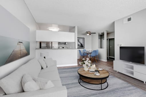 a living room with a couch and a table