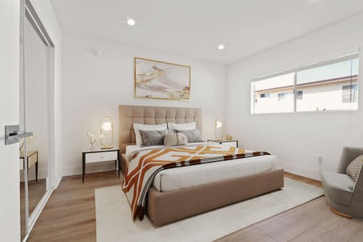 a bedroom with a bed and two windows