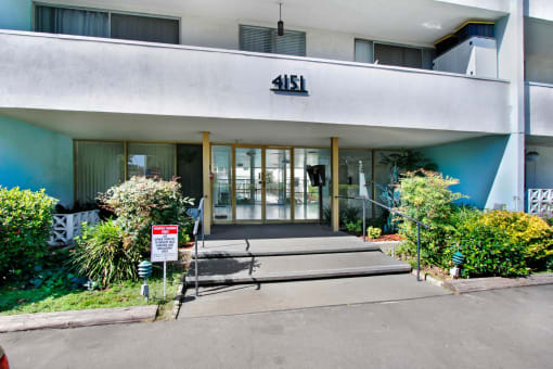 a picture of the front of a building with a ramp in front of it