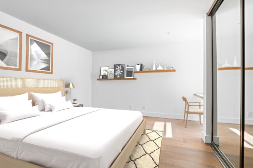 a bedroom with a bed and a sliding glass door