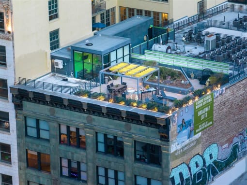a rooftop bar in a city