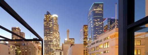 a view of a city skyline from a balcony