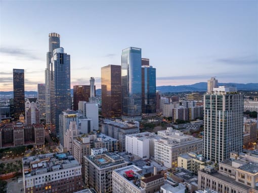 a view of the los angeles skyline at dusk
