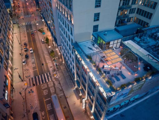an aerial view of a city street at night