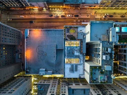 an aerial view of a city at night