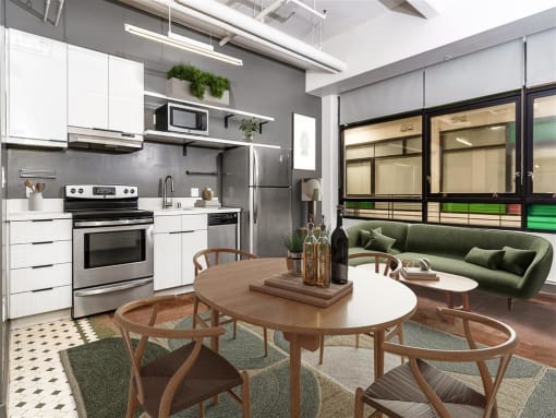 a kitchen with a stove top oven next to a table