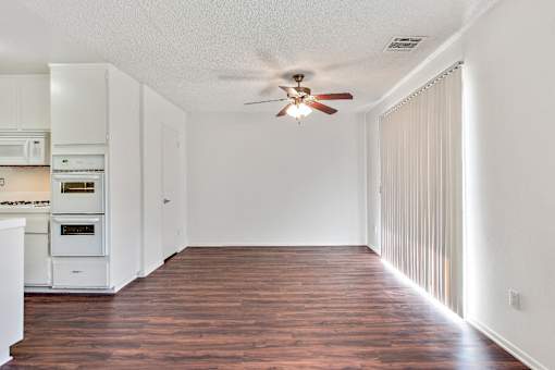 Dining area ;Ceiling Fan ; Hardwood Floors