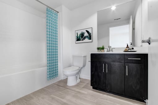 a bathroom with a toilet and a sink