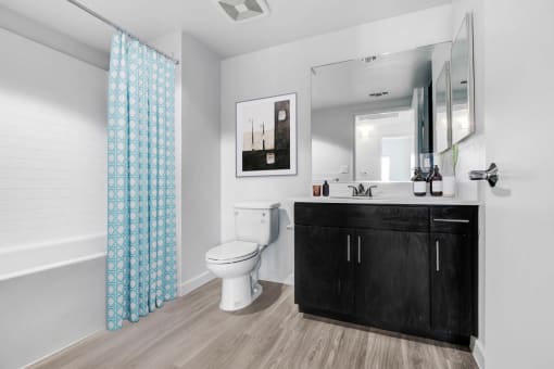 a bathroom with a toilet and a sink