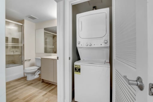 a room with a washer and dryer in it