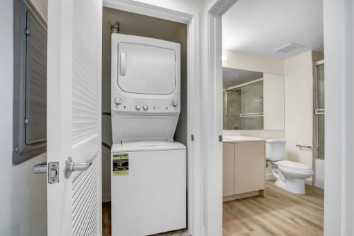 a washer and dryer in a bathroom