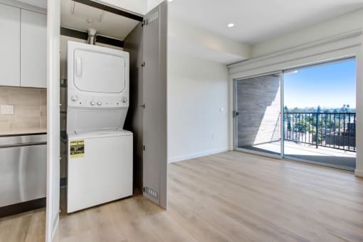a room with a washer and dryer in it