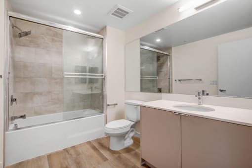 a bathroom with a toilet sink and bathtub