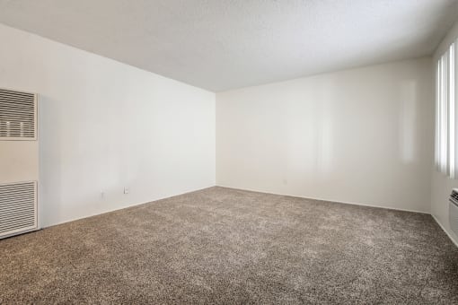 Living room with air conditioning, carpeted flooring