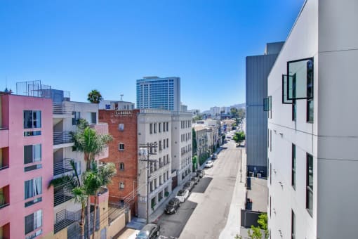 a view of a city street from a high rise building