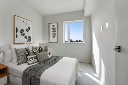 a bedroom with a large bed in a room