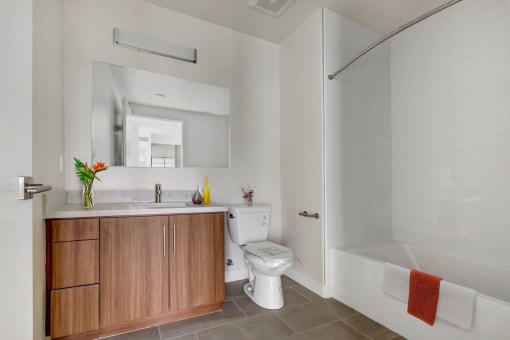 a bathroom with a toilet sink and bathtub