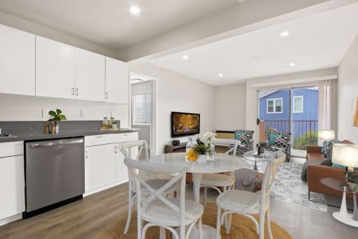a kitchen and dining area in a 555 waverly unit