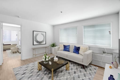 a living room with a couch and a coffee table