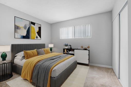 a bedroom with a bed and a dresser