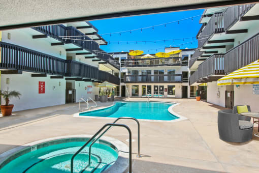 Resort-like hot tub, swimming pool and a picnic area on the side