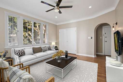 a living room with a couch and a coffee table