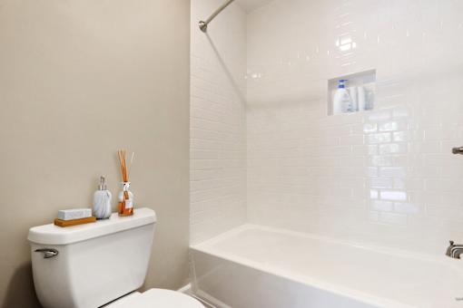 Bathroom with shower and hot tub combo
